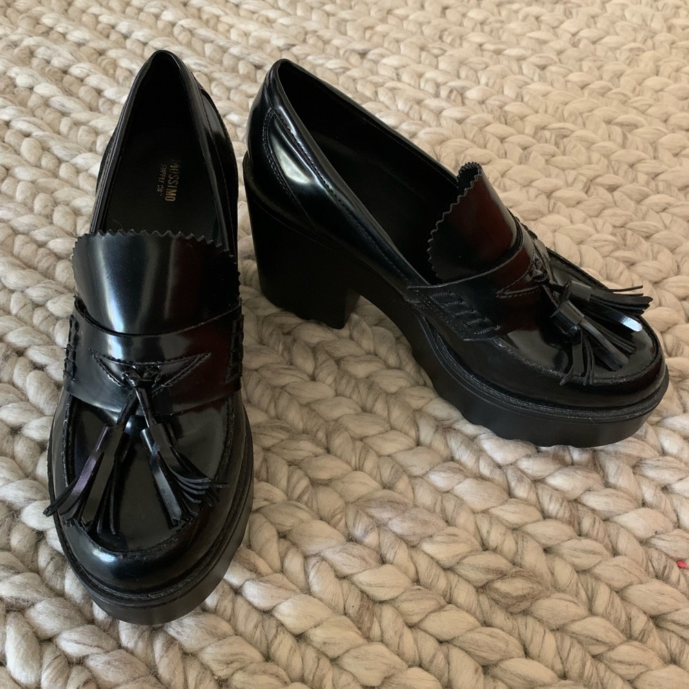 Mossimo black tassel loafers with chunky heel.